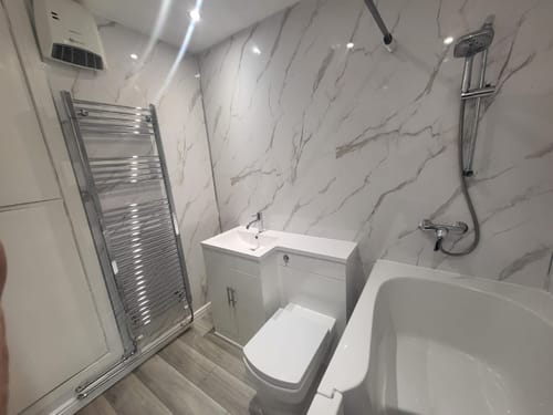 Customer photo review of Premium Carrara White Marble Gloss Shower Wall Panel – 2400 x 1000mm