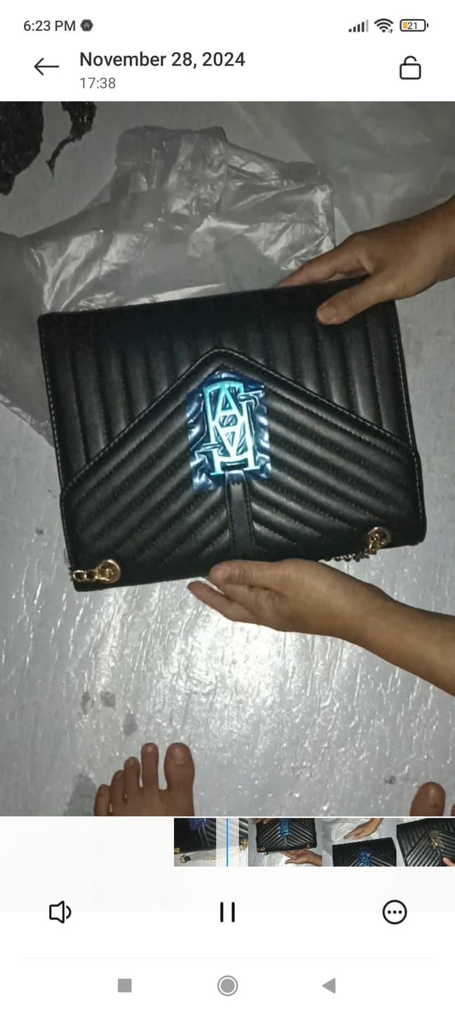 Customer photo review of MADRID LEATHER ENVELOPE BAG