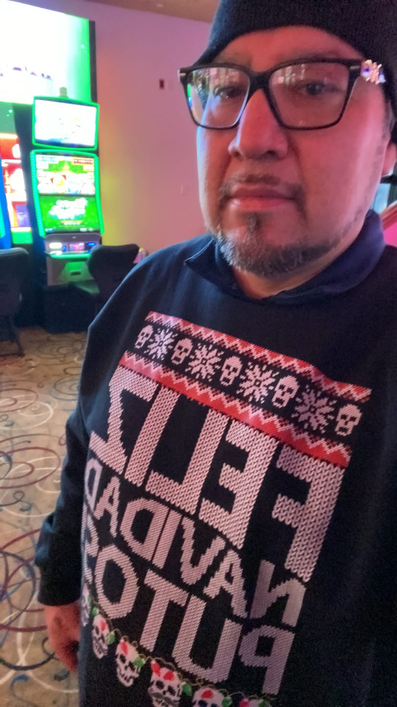 Customer photo review of Feliz Navidad Putos OG Navidad Sweatshirt