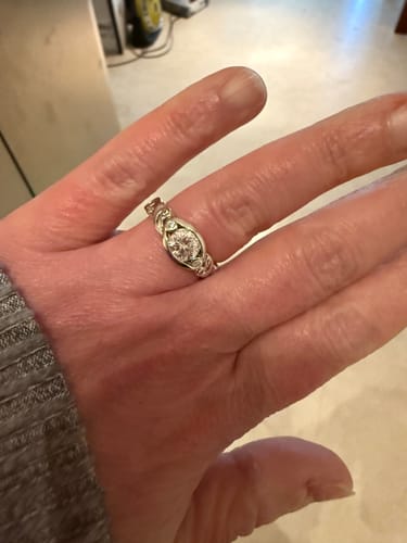 Customer photo review of Bezel Set Round Moissanite Scroll Accents Engagement Ring