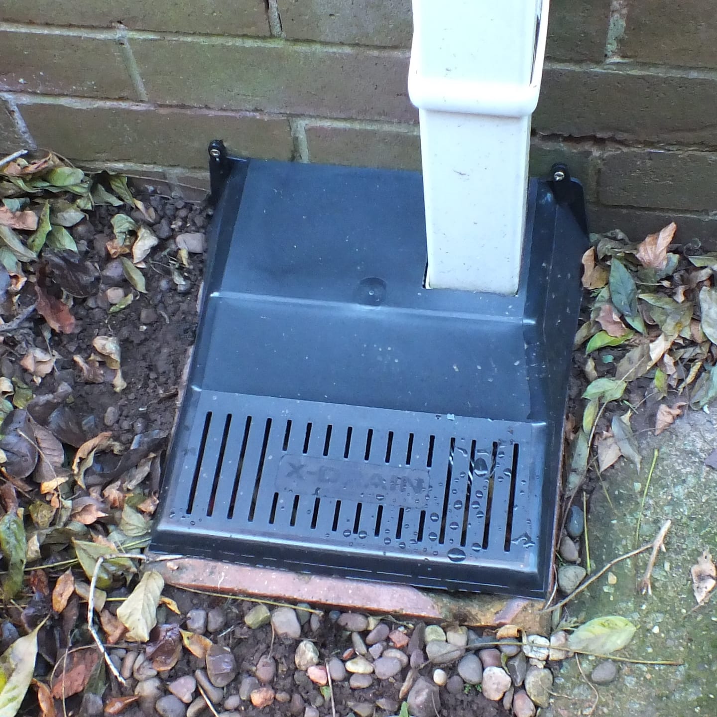 Customer photo review of XDrain Black Plastic Drain Cover Leaf Stopper 30x30x9cm.