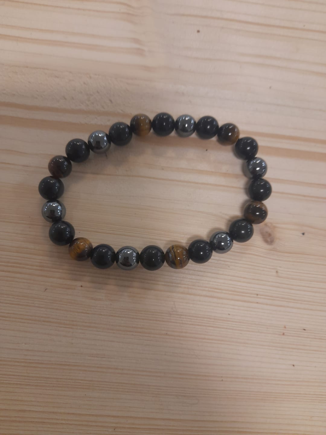 Customer photo review of Bracelet "Triple Protection" en Hématite, Oeil de Tigre et Obsidienne