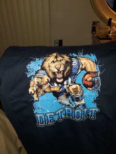 Customer photo review of Detroit Football Mascot T-Shirt – Fun Cartoon Lion Fan Tee for Game Day