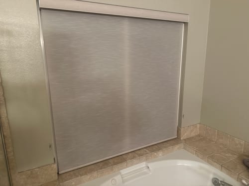 Customer photo review of SmartWings Motorized Light Filtering Roller Shades 70% Blackout Essential