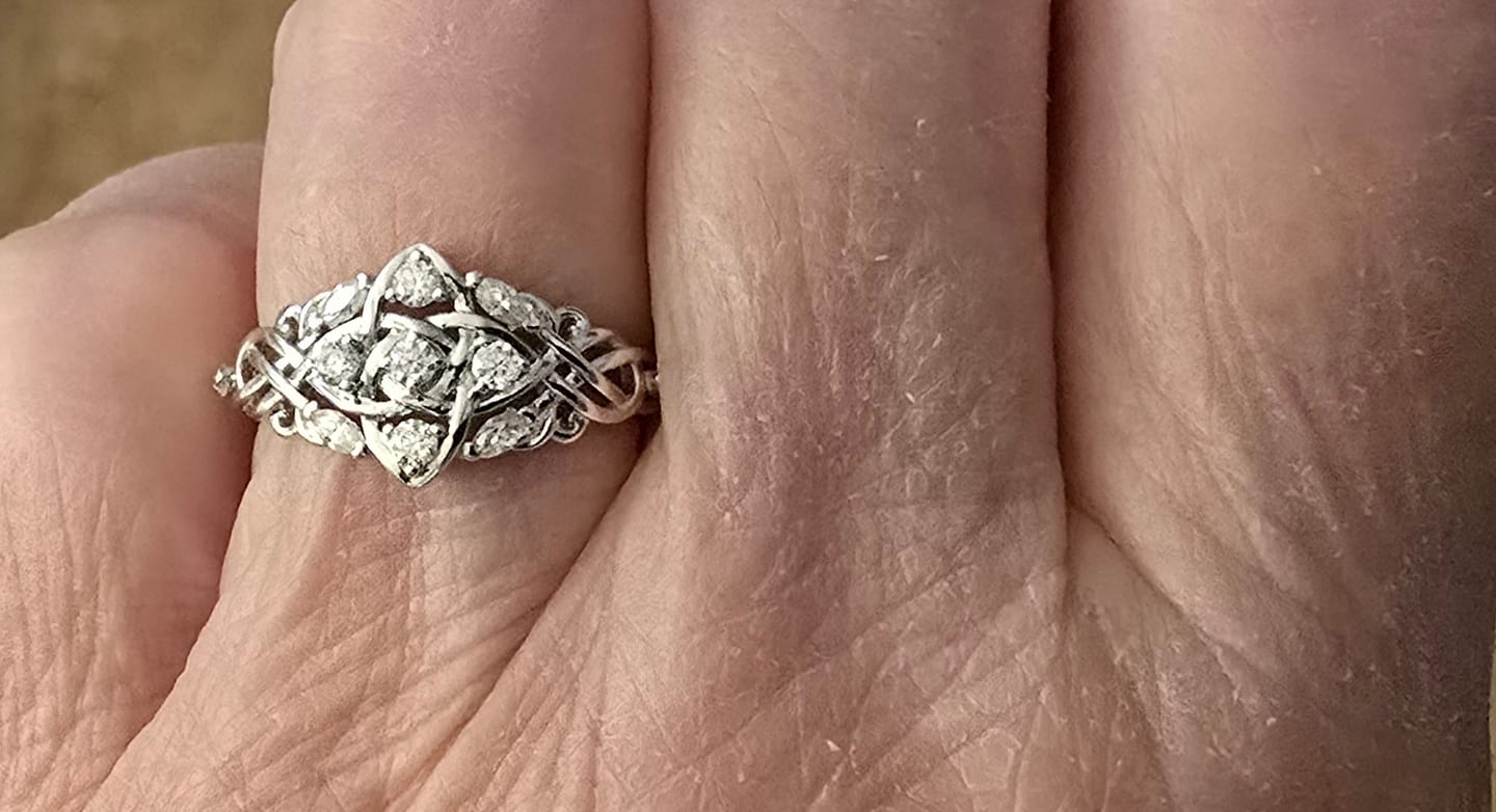 Customer photo review of Celtic Knot Moissanite Cluster Engagement Ring