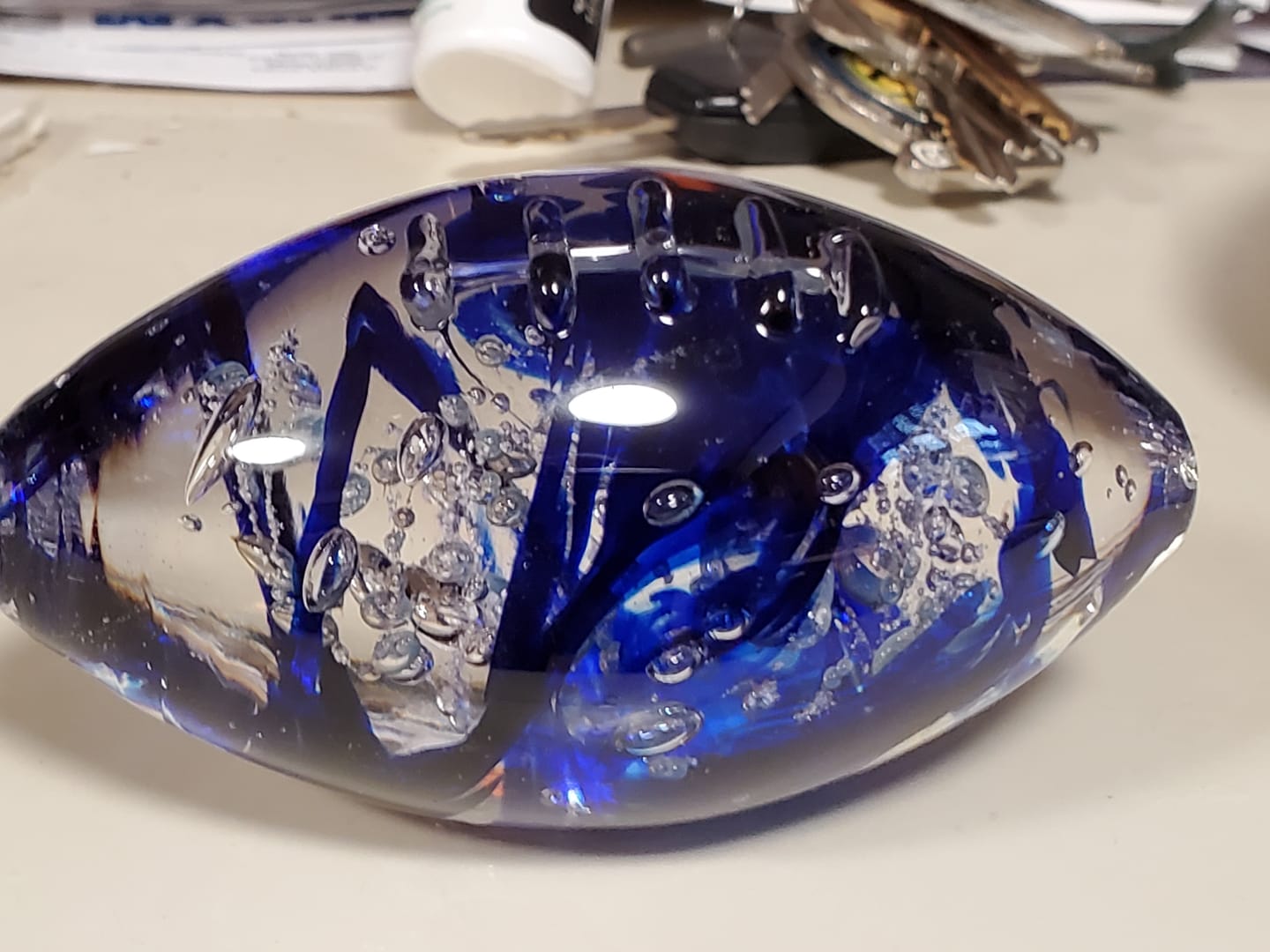 Customer photo review of Glass Football with Cremation Ash