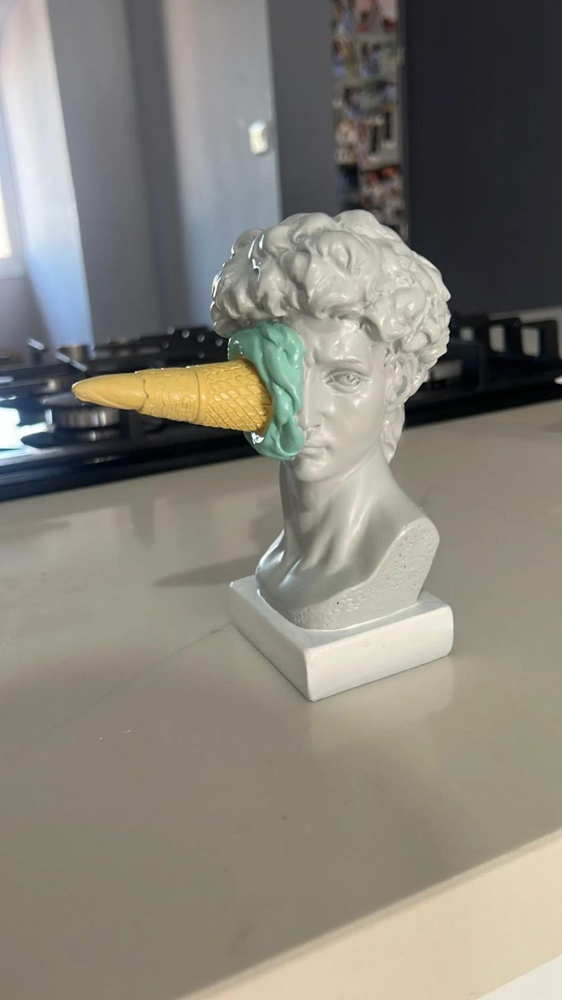 Customer photo review of In Your Face Resin Statue