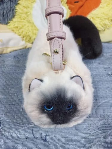 Customer photo review of Handgemachte Mädchentasche Plüsch-Katzen Messenger Bag