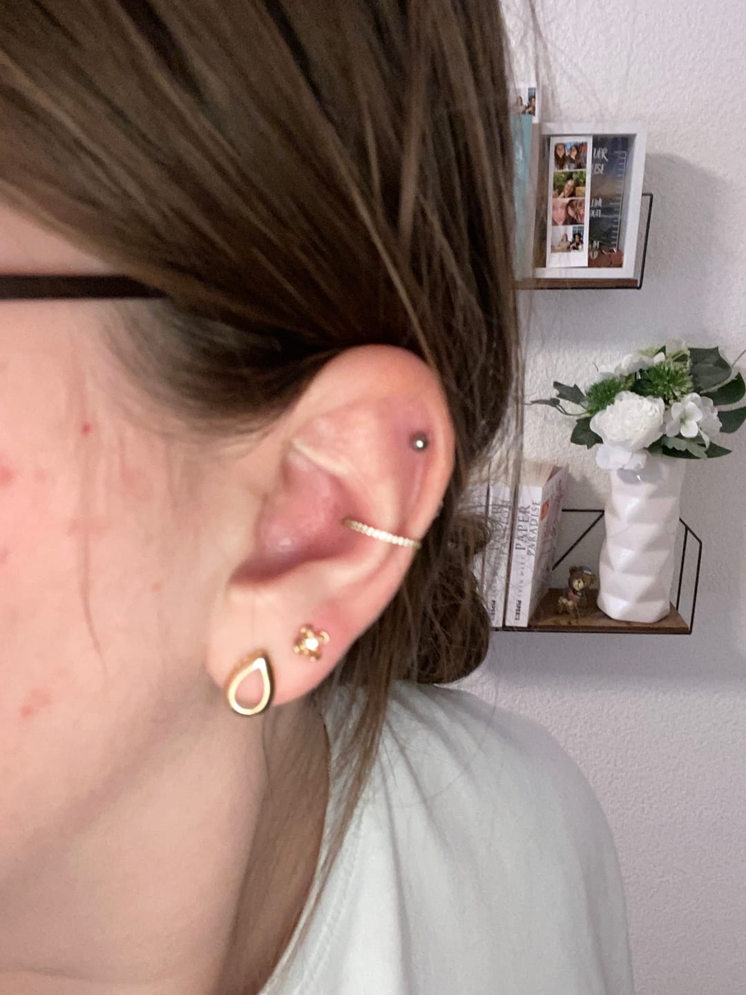 Customer photo review of Conch Clicker | Titan Piercing