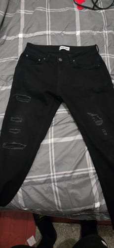Customer photo review of Black Slim Tapered Distressed Jeans