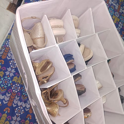Customer photo review of Qoolish 16-Pair Shoe Storage Organizer - Clear, Foldable, Space-Saving Shoe Cubby with Bottom Support