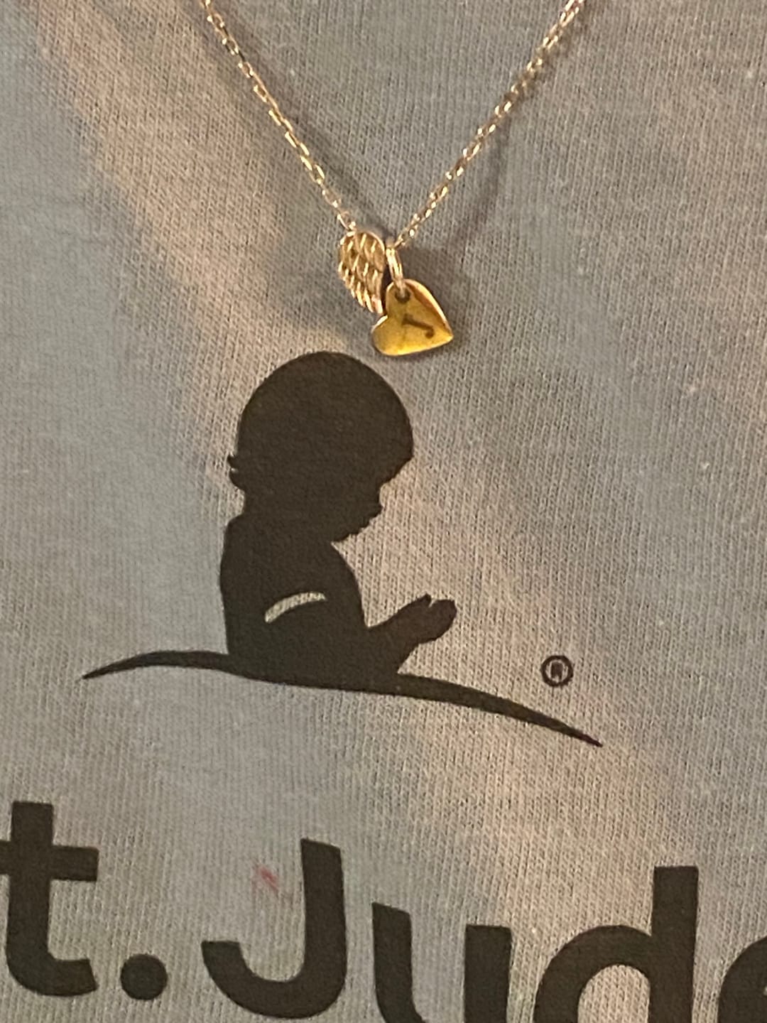 Customer photo review of always near angel wing necklace