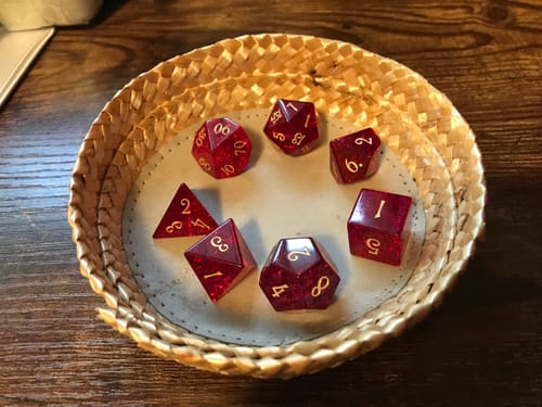 Customer photo review of URWizards D&D Blast Red Glass Engraved Dice Set