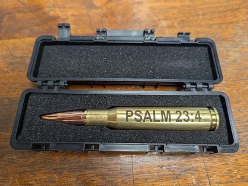 Customer photo review of 50 BMG Real Bullet Casing Refillable Twist Pen - Tactical Gift Box
