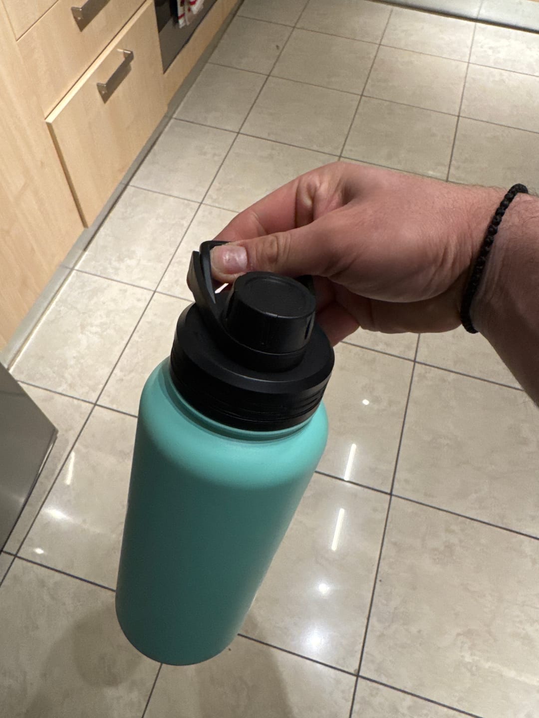 Customer photo review of DOZZE Water Bottle Sport Lid
