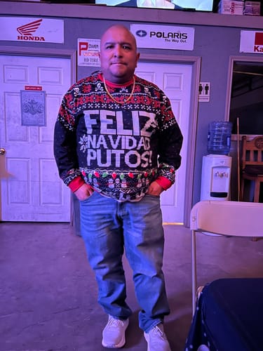 Customer photo review of Premium Fleece-lined FELIZ NAVIDAD PUTOS Sweatshirt
