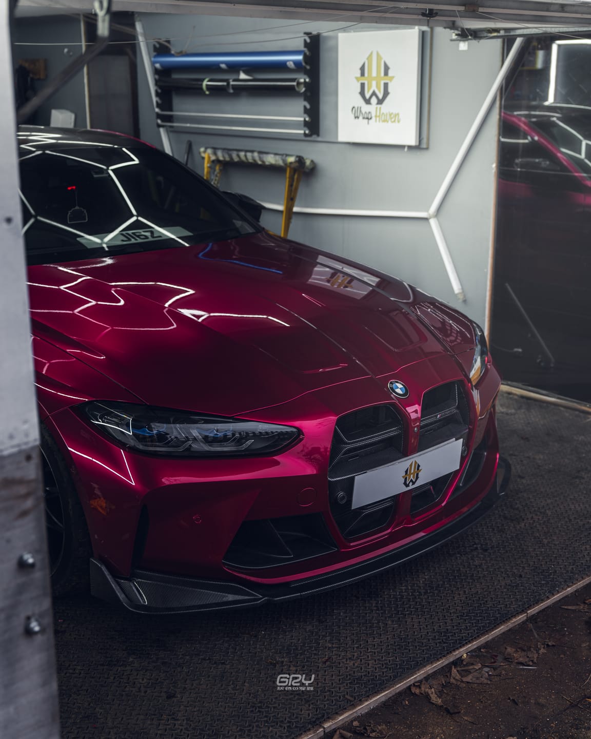 Customer photo review of Glossy Metallic Rubellite Purple Vinyl Wrap