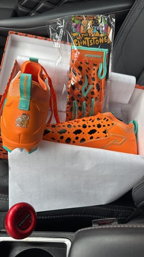 Customer photo review of The Flintstones "Bedrock Blitz" Football Cleats - Quantum Speed by Phenom Elite