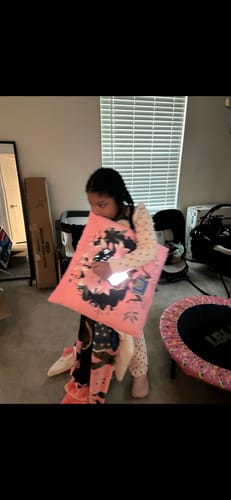Customer photo review of AFROBRATS Lily Fleece Throw Blanket