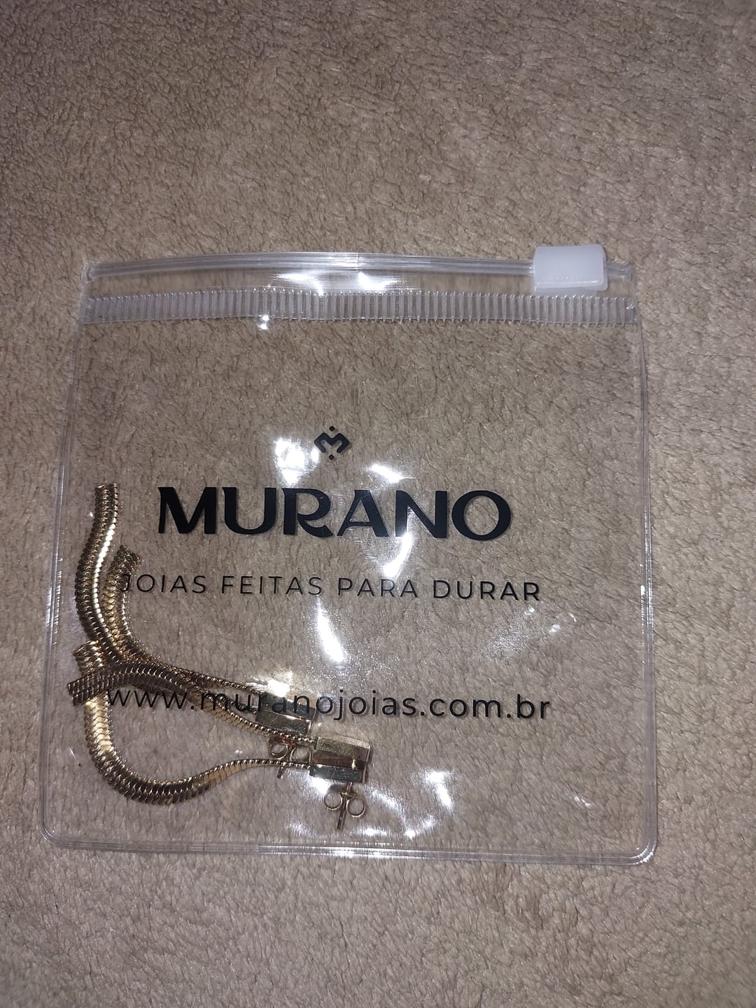Customer photo review of Brinco Catarina Malha Metal Banhado em Ouro 18K