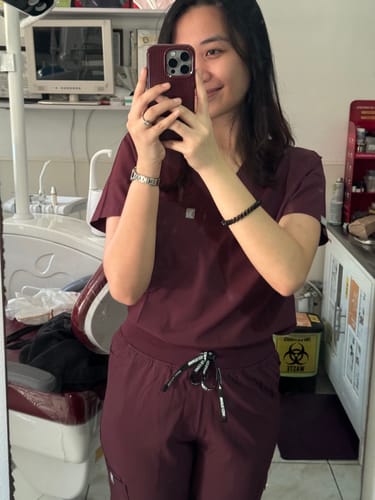 Customer photo review of 4-Pocket MoveTech® Scrub Top - Women / Merlot
