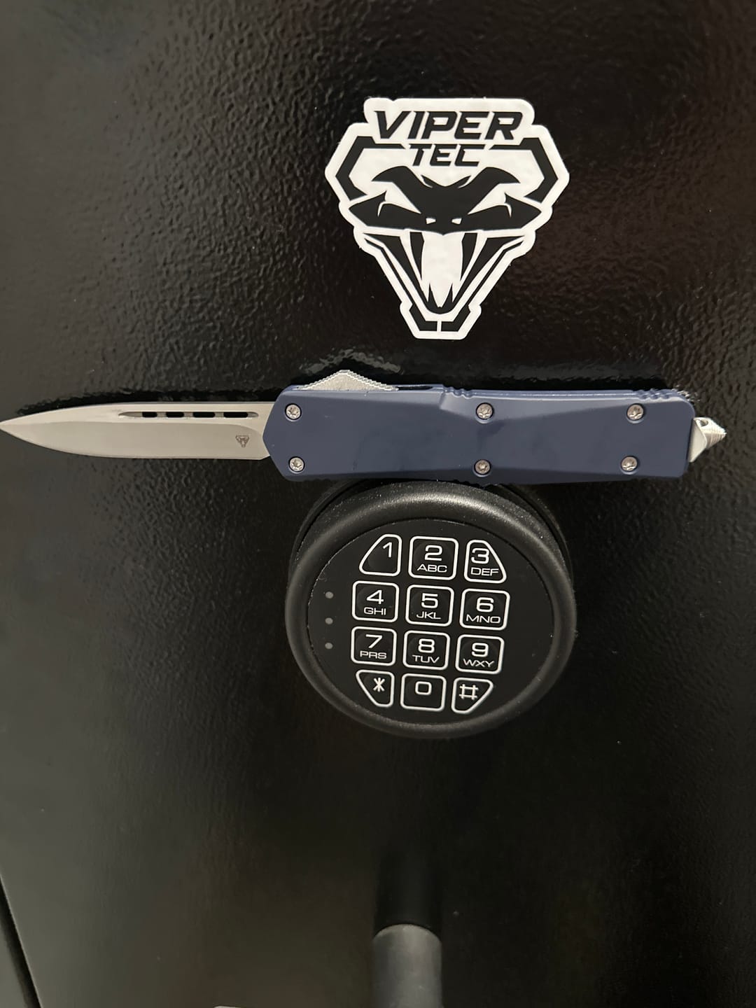 Customer photo review of Blue Ghost OTF Knife (Multiple Blade Styles Available)