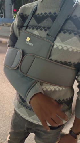 Customer photo review of Shoulder Immobilizer | Provides Firm Support for Shoulder Dislocation & Relieves Pain (Grey)