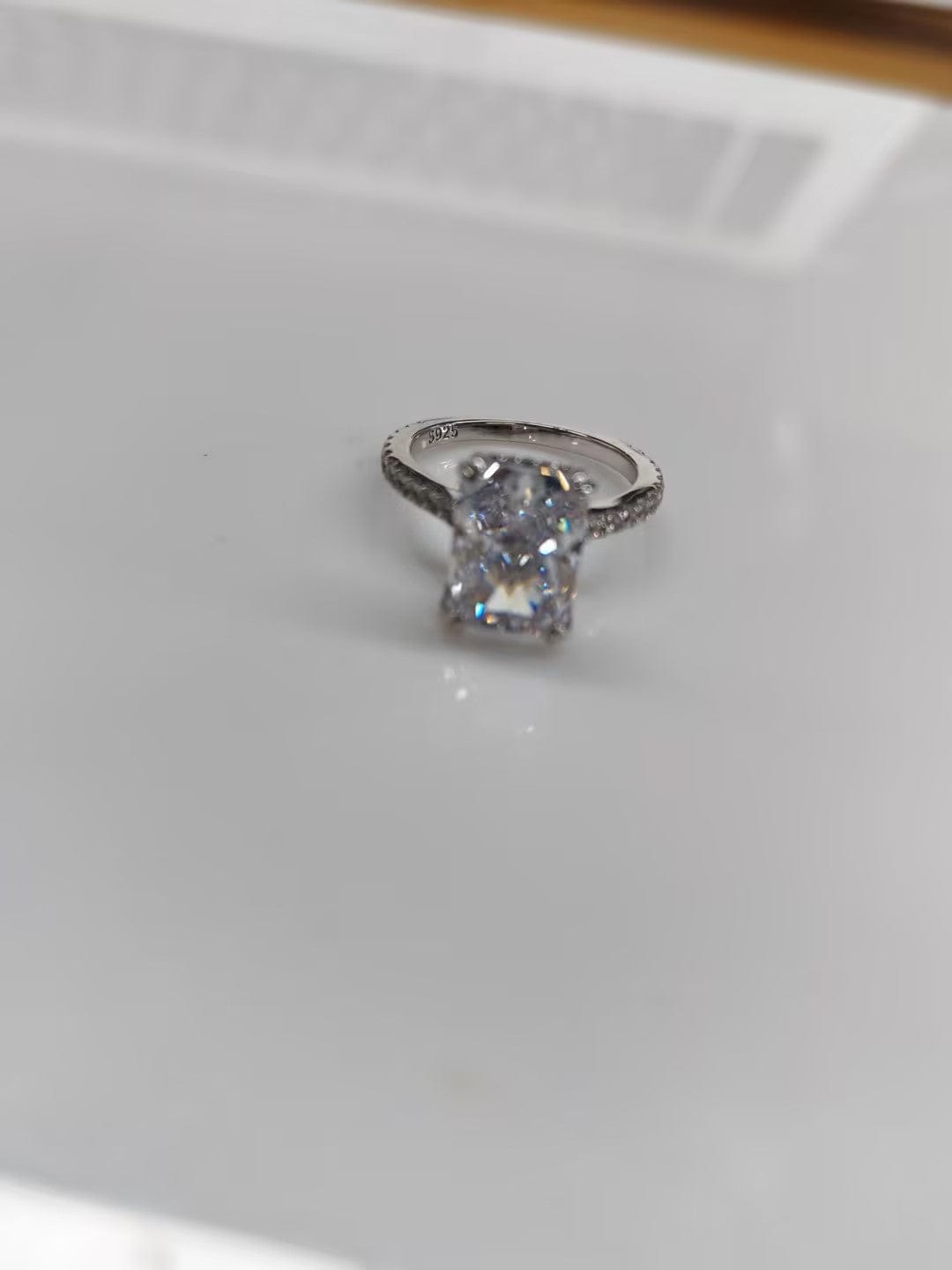 Customer photo review of S925 4.5Ct Radiant Cut Engagement Ring Moissanite/Simulated Diamond Solitaire Stackable Travel Ring For Women