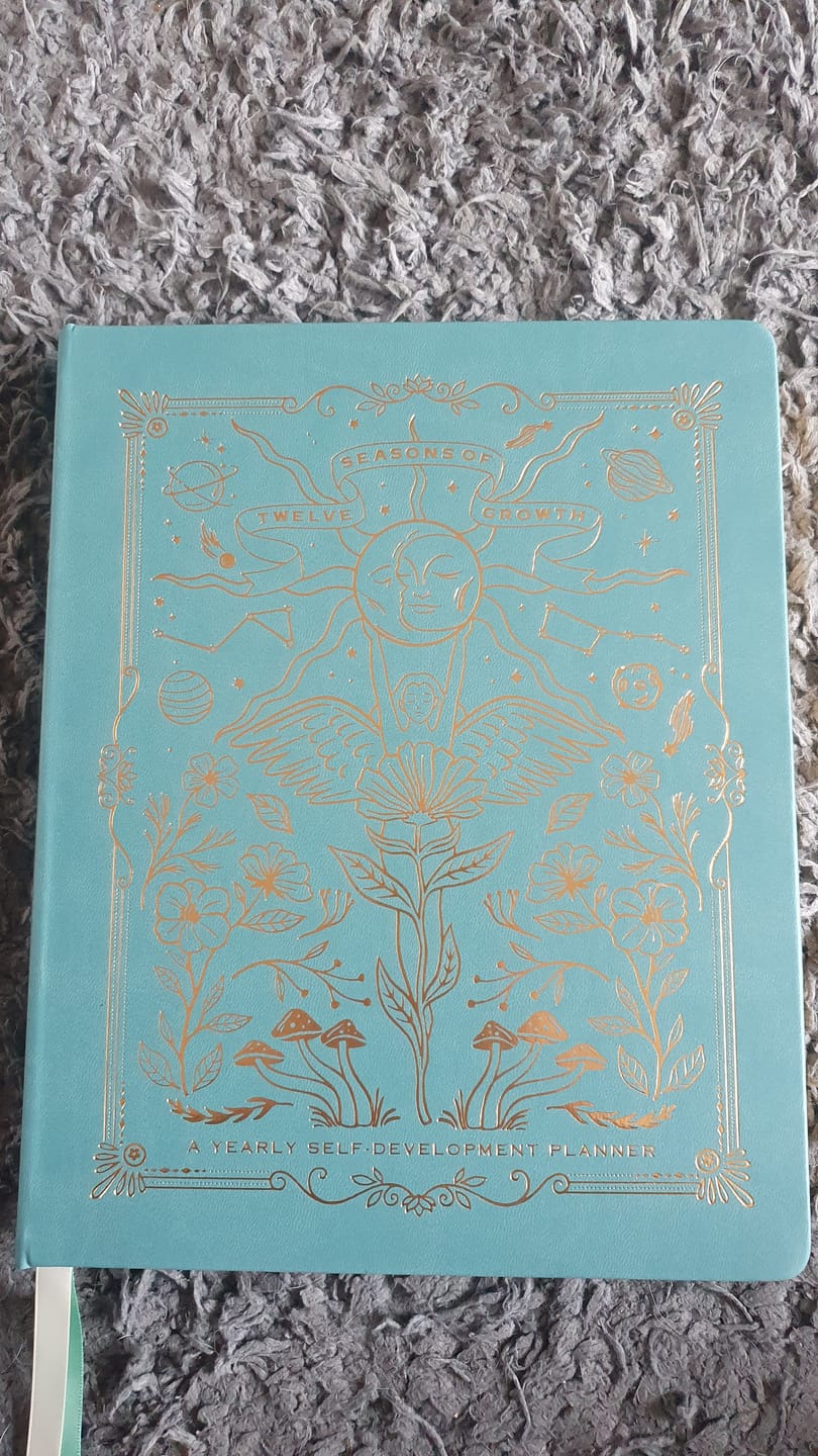 Customer photo review of *PRE-SALE* Twelve Seasons of Growth -  Yearly Self Development Planner (Undated)