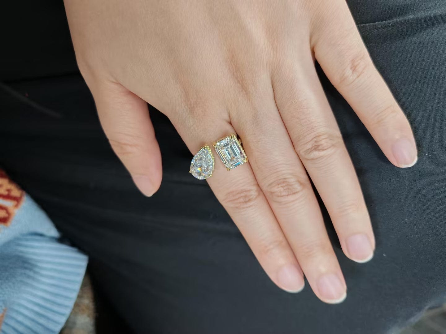 Customer photo review of Louily Unique Double Stones Design Emerald Cut & Pear Cut Engagement Ring