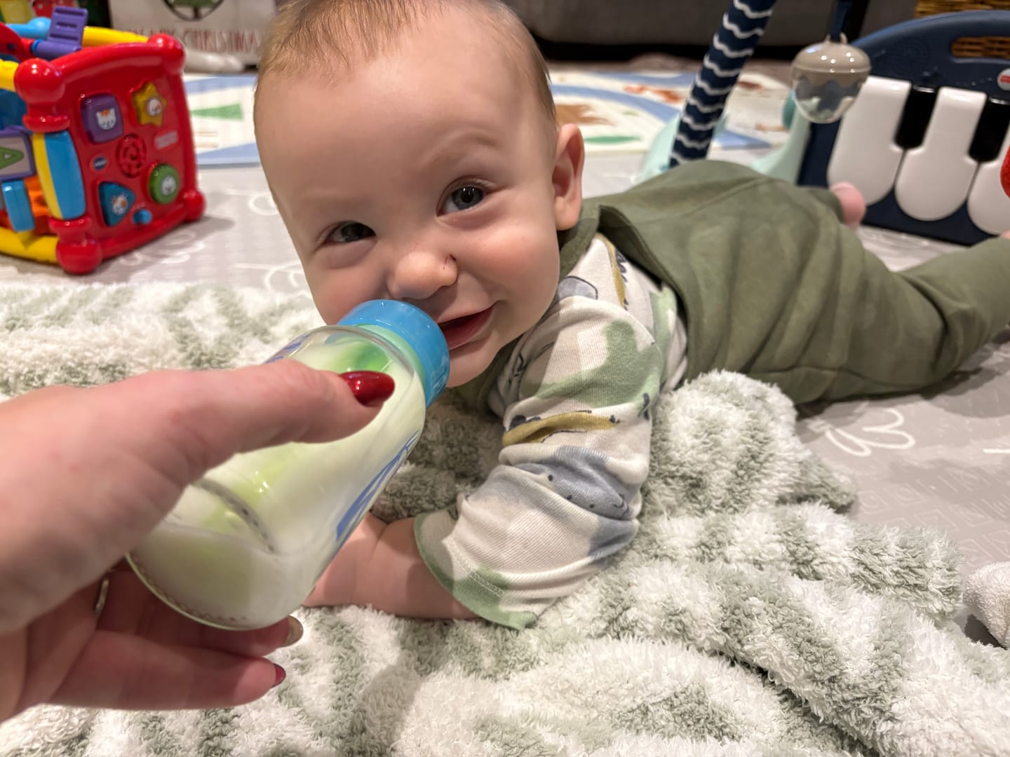 Customer photo review of Desert Sage & White Diamond Point Print Toddler Blanket