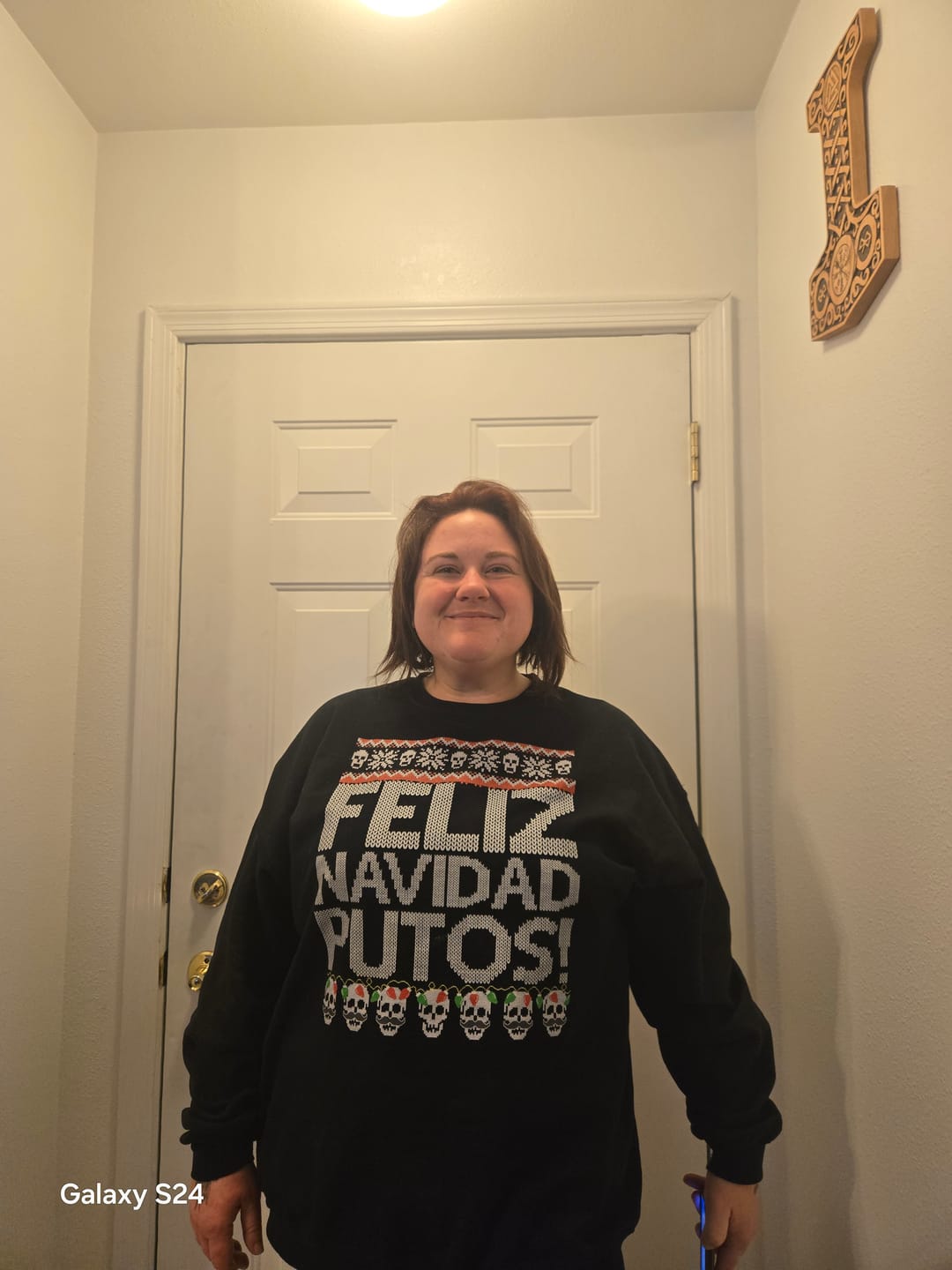 Customer photo review of Feliz Navidad Putos OG Navidad Sweatshirt