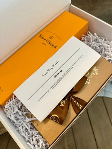 Customer photo review of Veuve Clicquot Brut w/10pc Sweet Shop Truffles