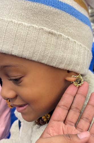 Customer photo review of Girl's Twisted Hoop Name Earrings