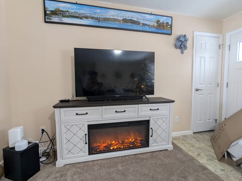Customer photo review of 68" Grooved Door Farmhouse Fireplace TV Stand