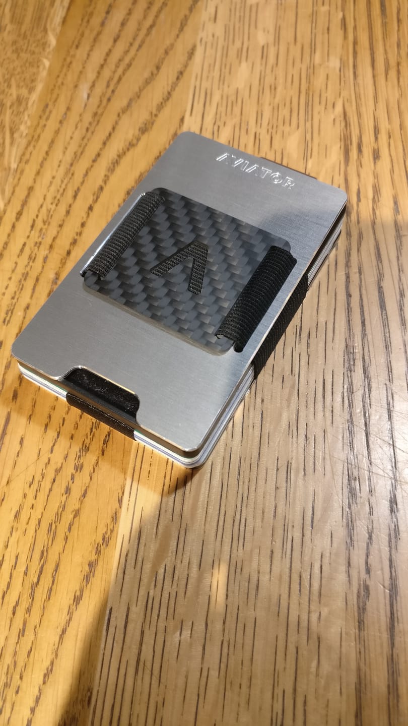 Customer photo review of NOT FLAW[LESS] Brushed Silver Aluminum Slim Wallet