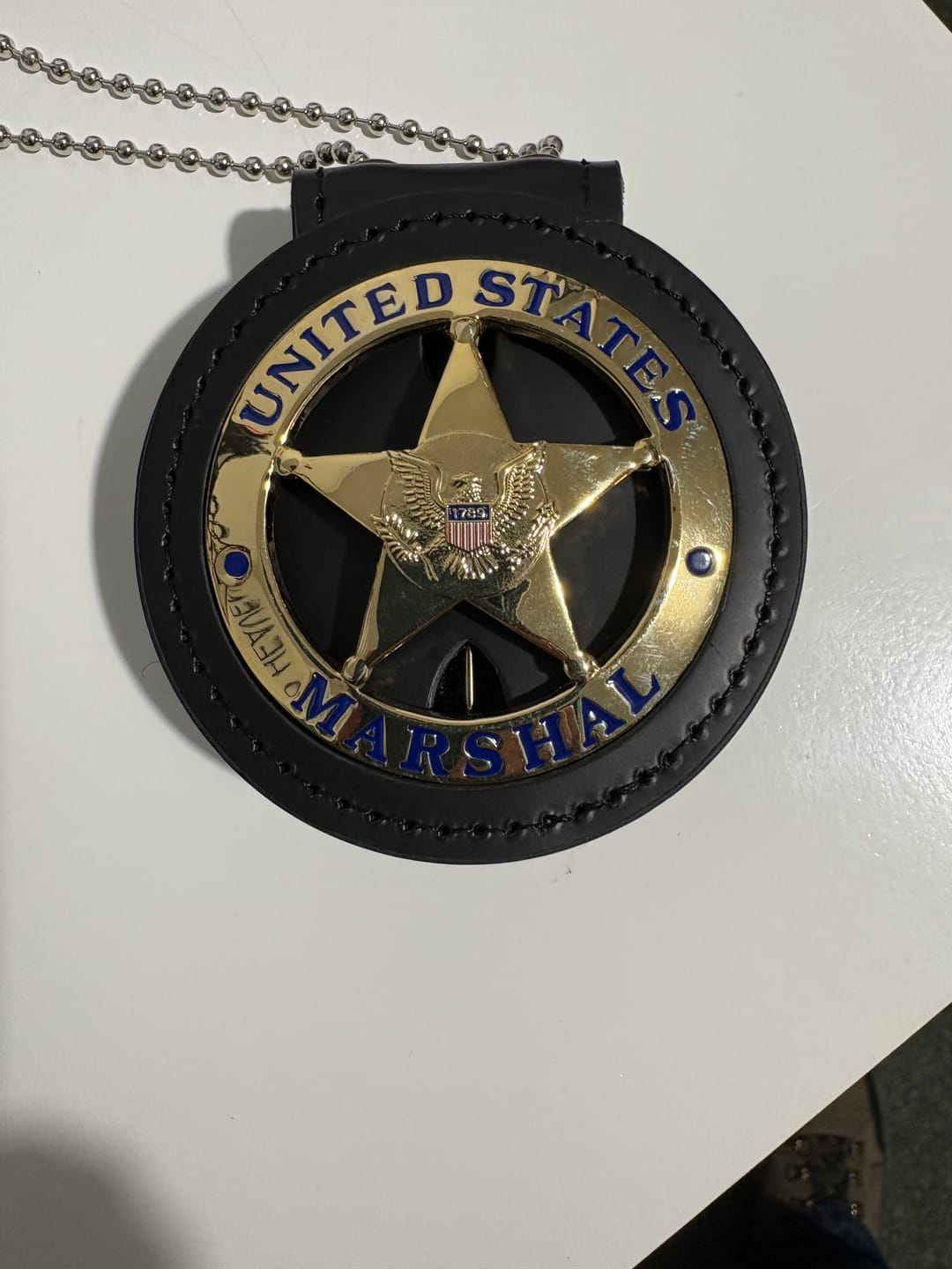 Customer photo review of US Federal Court Law Enforcement Marshal Gold Badge Replica Movie Props