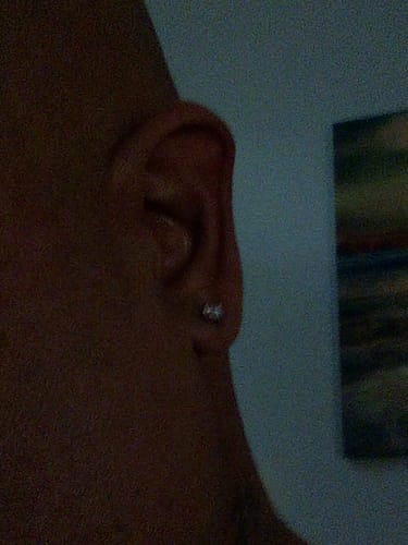 Customer photo review of 5MM Round Moissanite Stud Earrings