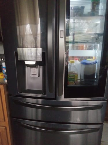 Customer photo review of Glacier Fresh Refrigerator Water Drip Tray Cache For Fridge Water Dispenser From Water Splatter and Spills, 2-Pack