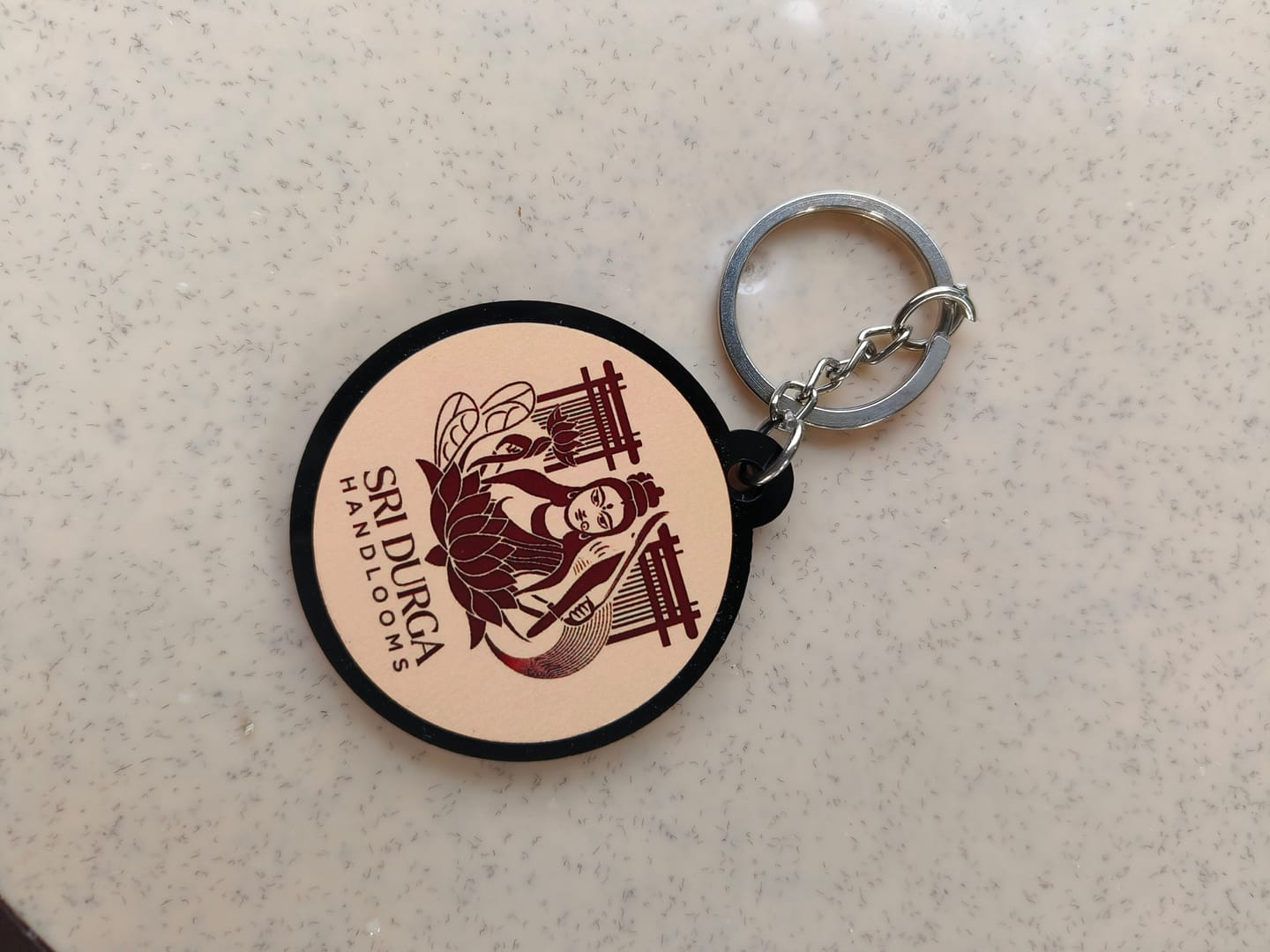 Customer photo review of Premium Customized Keychains | Best for Brand Promotion | PrintMine.in
