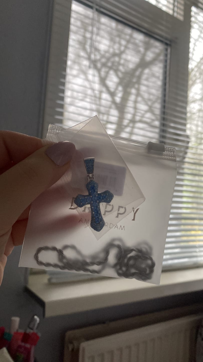 Customer photo review of BLUE CROSS PENDANT. - WHITE GOLD