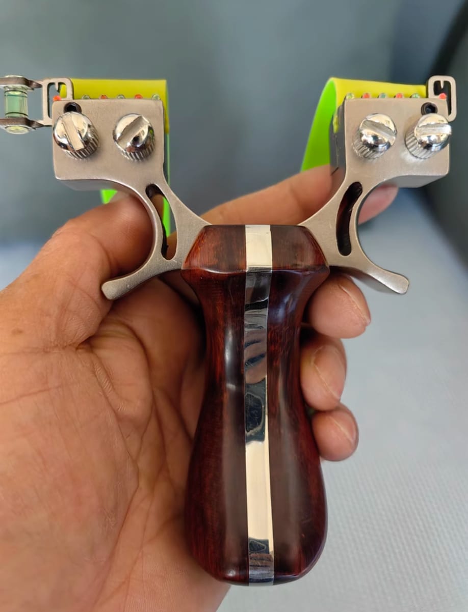 Customer photo review of Stainless Steel Wooden Handle Laser Hunting Slingshot II: Precision Redefined