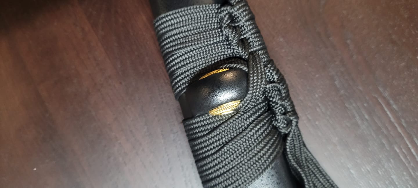 Customer photo review of The Tanjiro Handmade Katana T10 Steel Clay Tempered From Demon Slayer