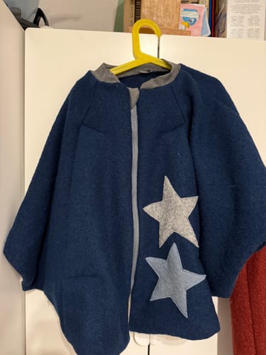 Customer photo review of Kindersitzponcho Wollwalk "Petrol"
