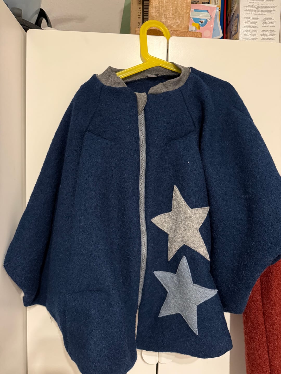 Customer photo review of Kindersitzponcho Wollwalk "Petrol"