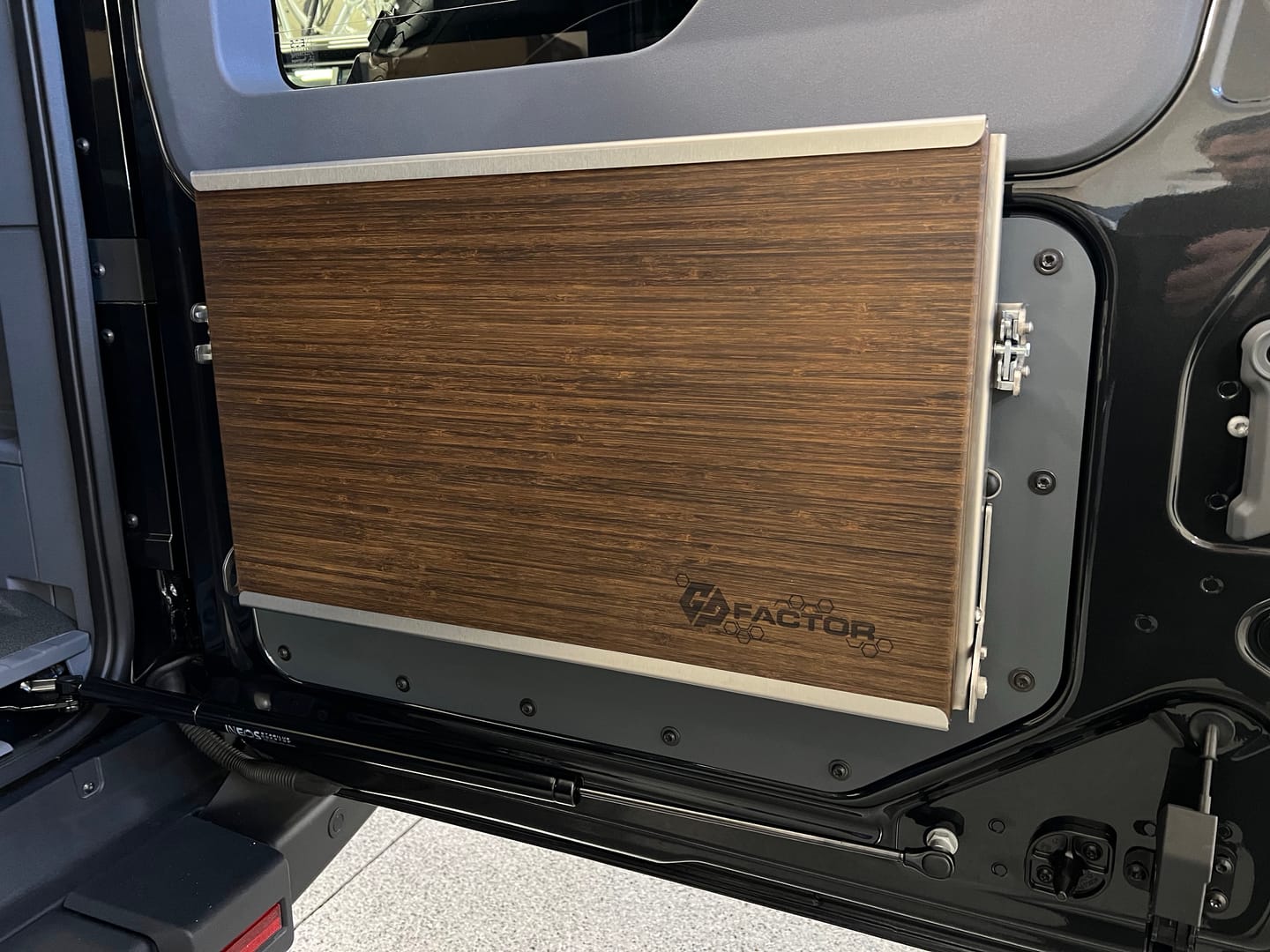Customer photo review of Ineos Grenadier V2 Folding Tailgate Table with Extended Storage Cubby