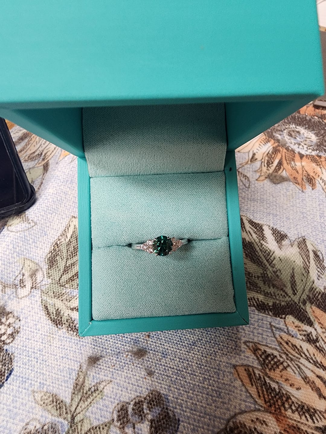 Customer photo review of Green Moissanite Side Stone Engagement Ring
