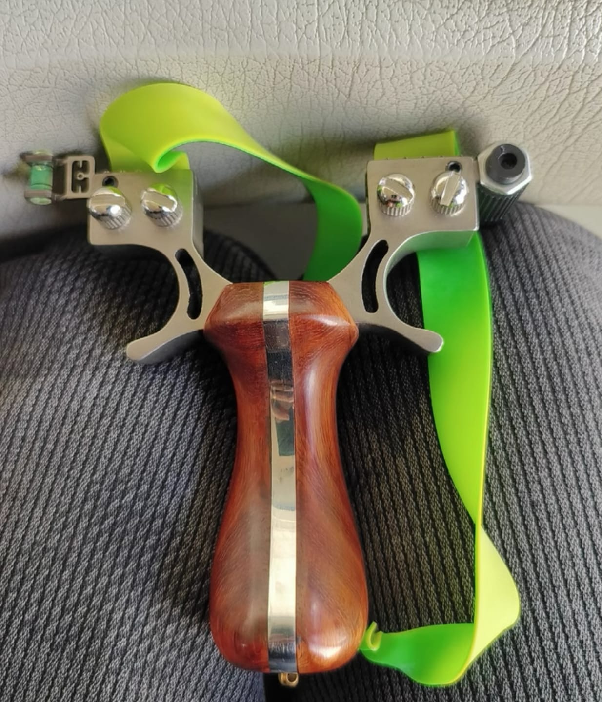Customer photo review of Stainless Steel Wooden Handle Laser Hunting Slingshot II: Precision Redefined