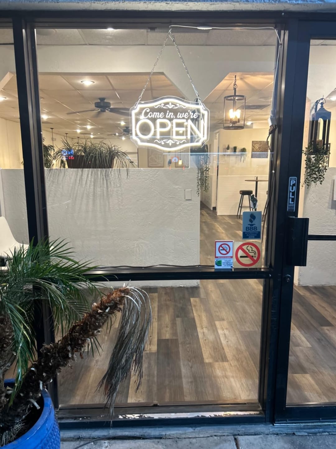Customer photo review of Come In We're Open Neon Sign Engraved Business Led Light
