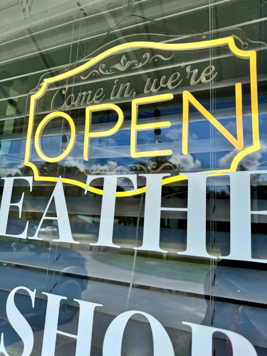 Customer photo review of Come In We're Open Neon Sign Engraved Business Led Light